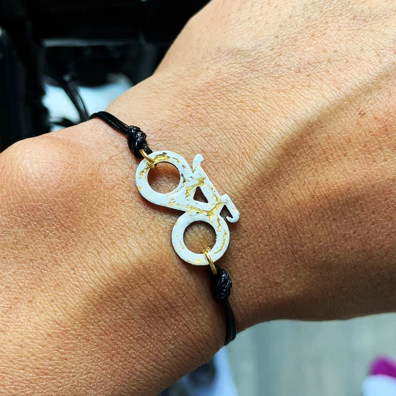 Braccialetto di bici bianco e oro